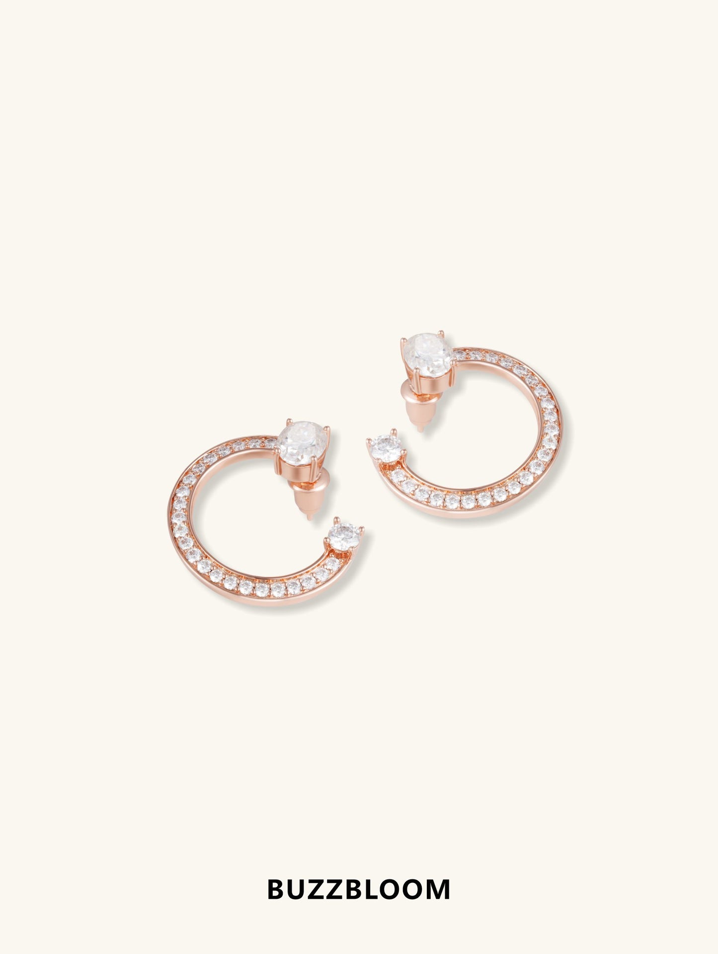 Front view of 14K rose gold fashion earrings with oval diamonds and pavé setting