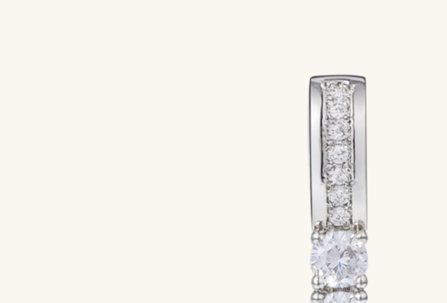BUZZBLOOM 14K diamond cross pendant bail detail, featuring additional pavé-set diamonds for an extra touch of brilliance.