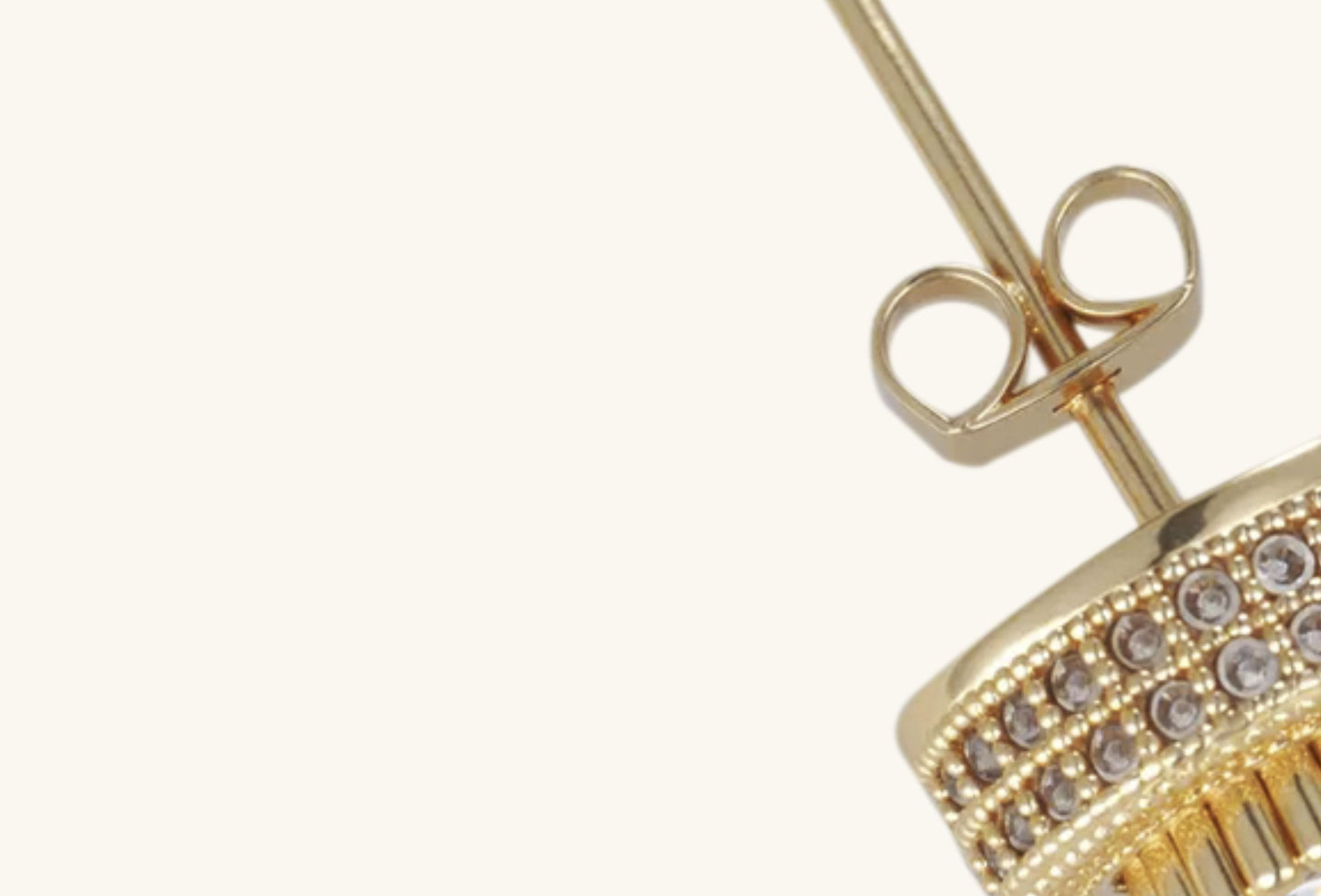 BUZZBLOOM 14K round full diamond stud earrings, close-up side view highlighting expert craftsmanship and polished 14K gold finish.