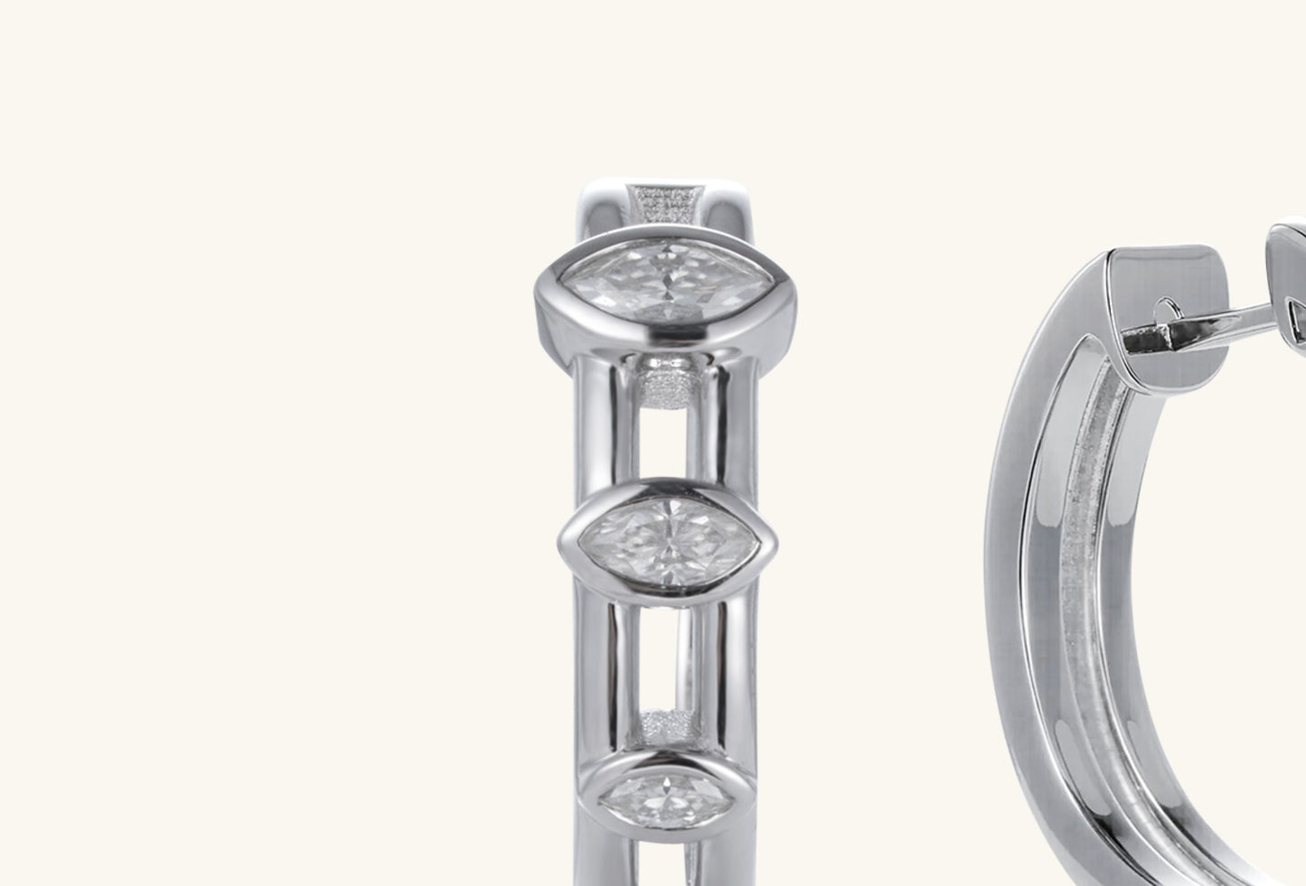 Macro detail of BuzzBloom 14K white gold hoop earring highlighting marquise diamond brilliance and craftsmanship.