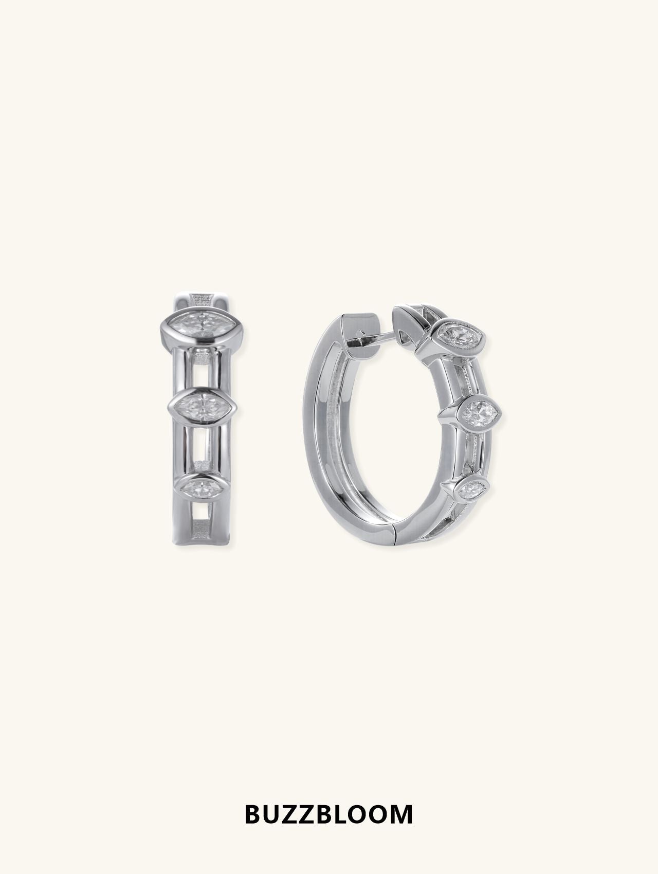 BuzzBloom 14K white gold hoop earrings with three marquise-cut bezel-set diamonds, front view.