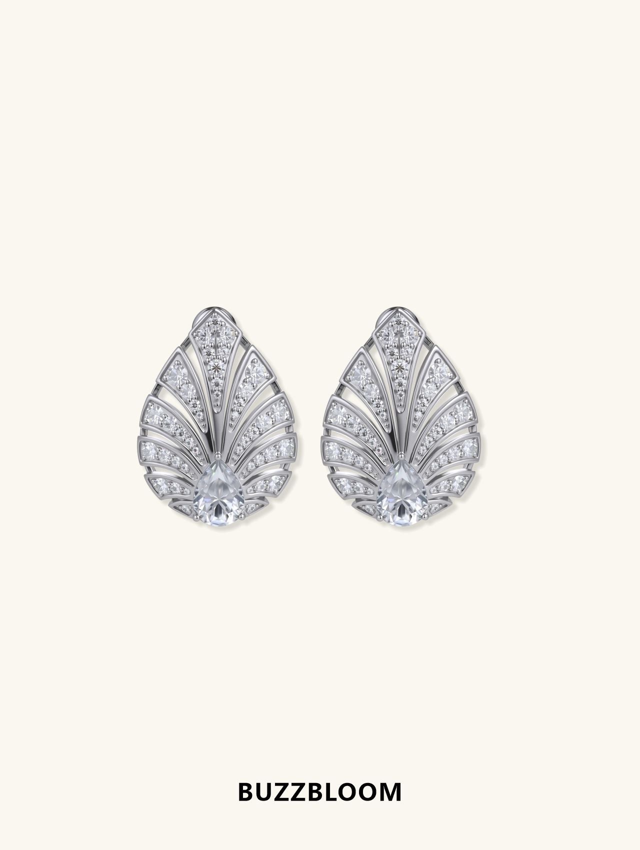 BuzzBloom 14K white gold pave-set diamond earrings with pear-shaped center stone, front view.