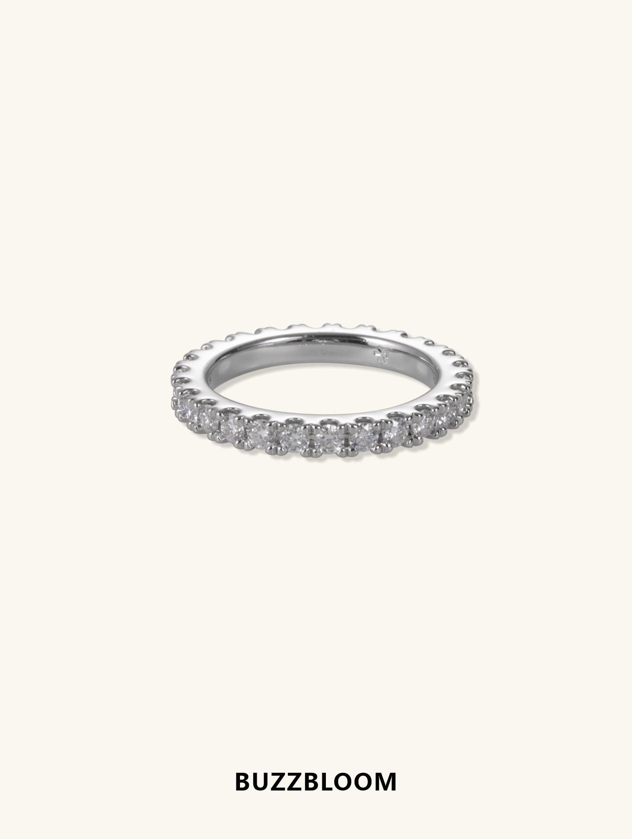 Buzzbloom delicate 14K white gold pavé diamond band, slim design with brilliant diamonds across the top, front view.