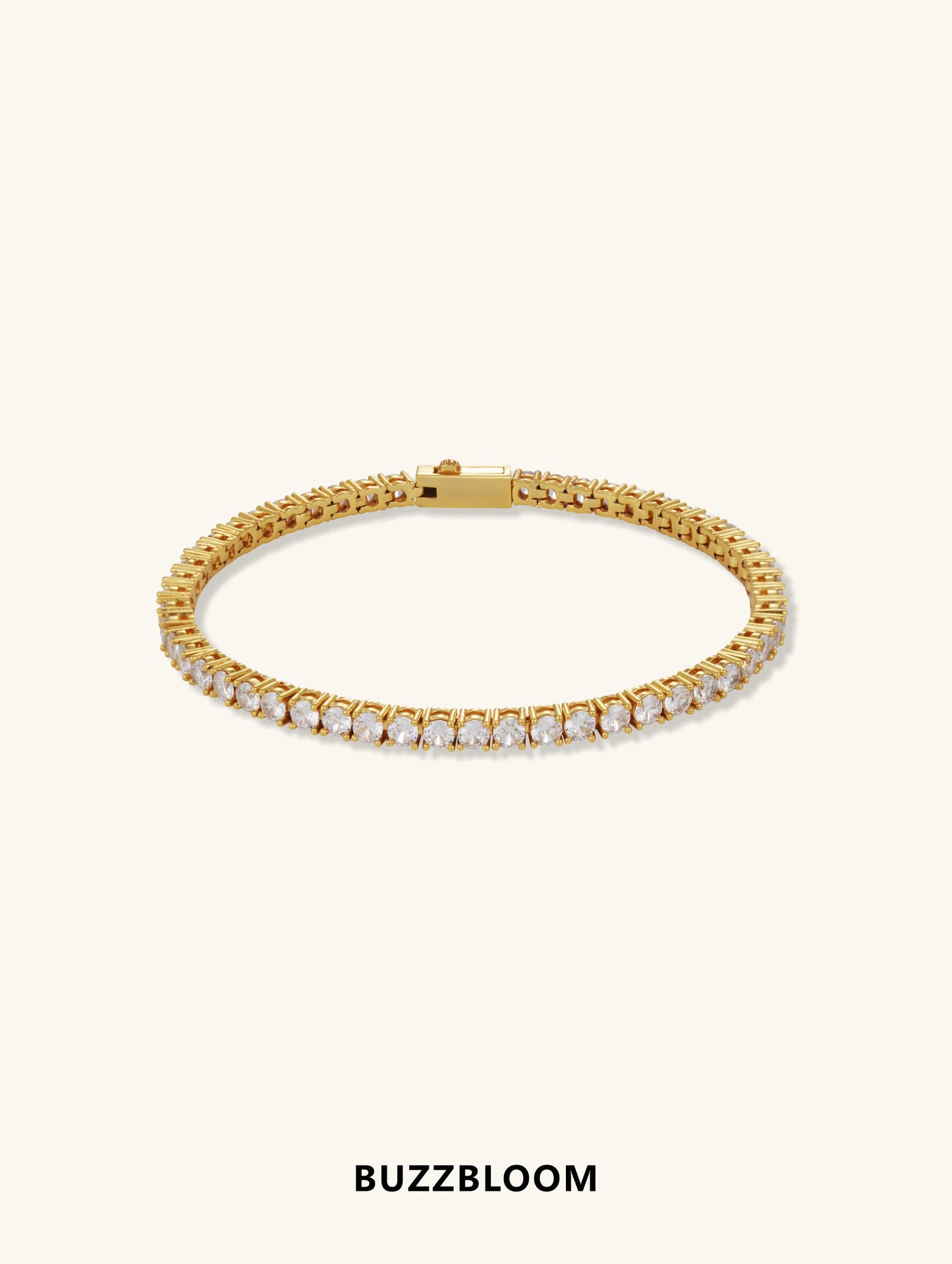 BuzzBloom 4mm Diamond 14K Tennis Bracelet front view, round-cut diamonds set in 14K yellow gold with classic four-prong design.