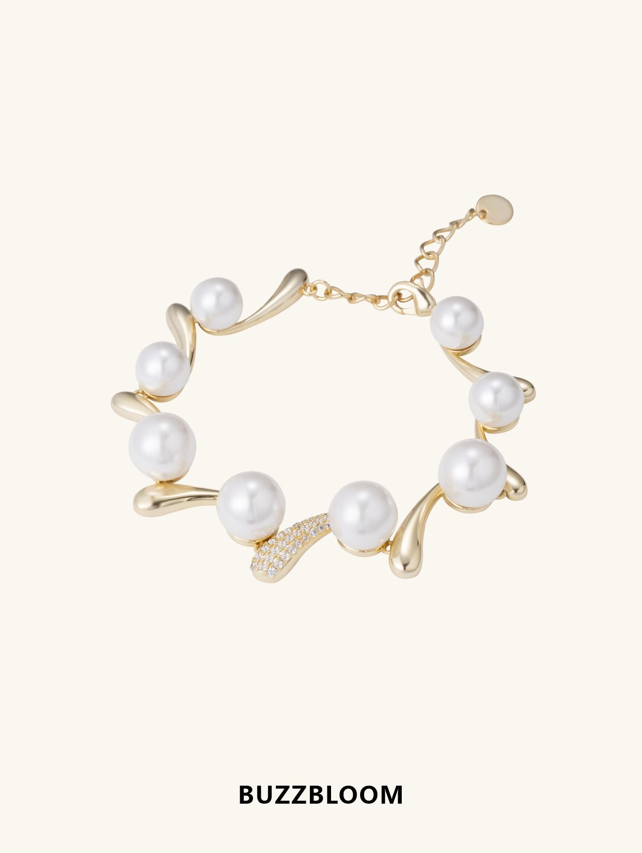 BuzzBloom Australian White Shell Pearl 14K Diamond Bracelet, angled view highlighting lustrous pearls and curved gold design.