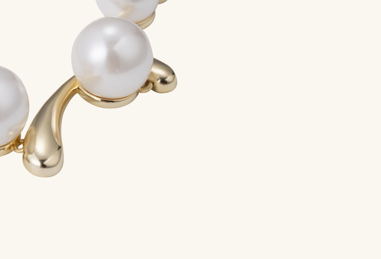 BuzzBloom Australian White Shell Pearl 14K Diamond Bracelet styled on soft beige fabric with elegant lighting.