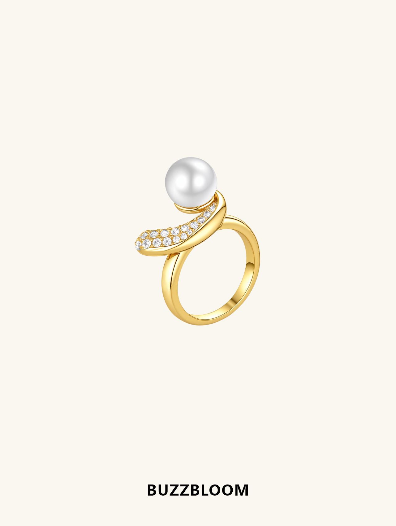 Angled view of BuzzBloom Australian white shell pearl ring in 14K gold, pavé diamond detail.