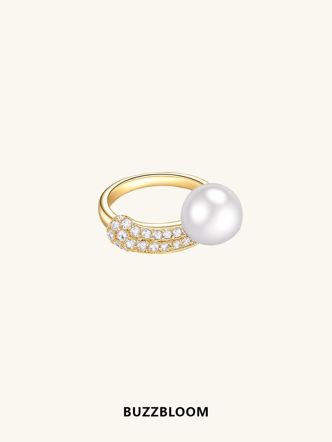 BuzzBloom Australian white shell pearl ring in 14K gold with pavé-set diamonds, front view.