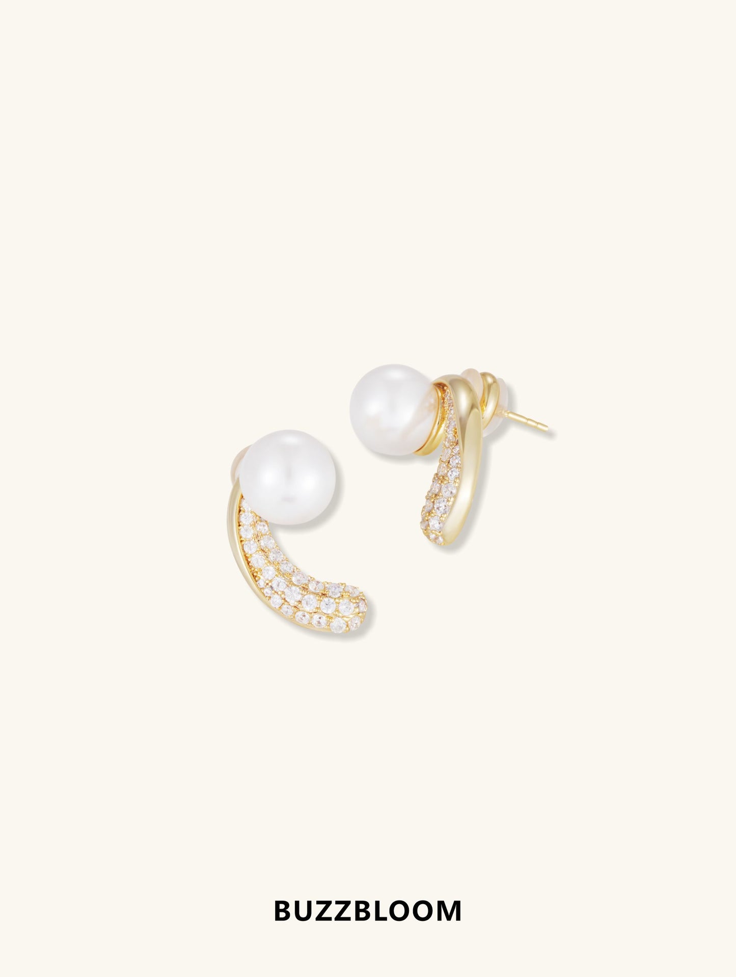Buzzbloom Australian White Shell Pearl 14K Diamond Stud Earrings, angled view showing pavé-set diamonds and lustrous shell pearls.