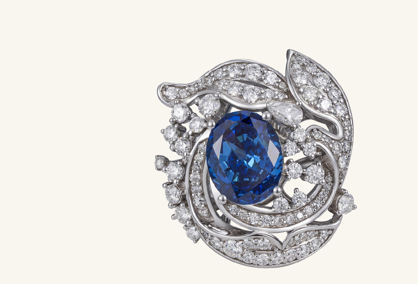 Profile view showing sapphire ring’s white gold band and diamonds