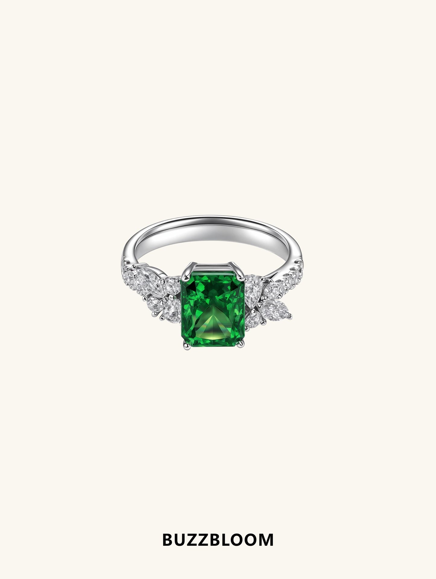 BuzzBloom emerald cut green gemstone cluster ring front view