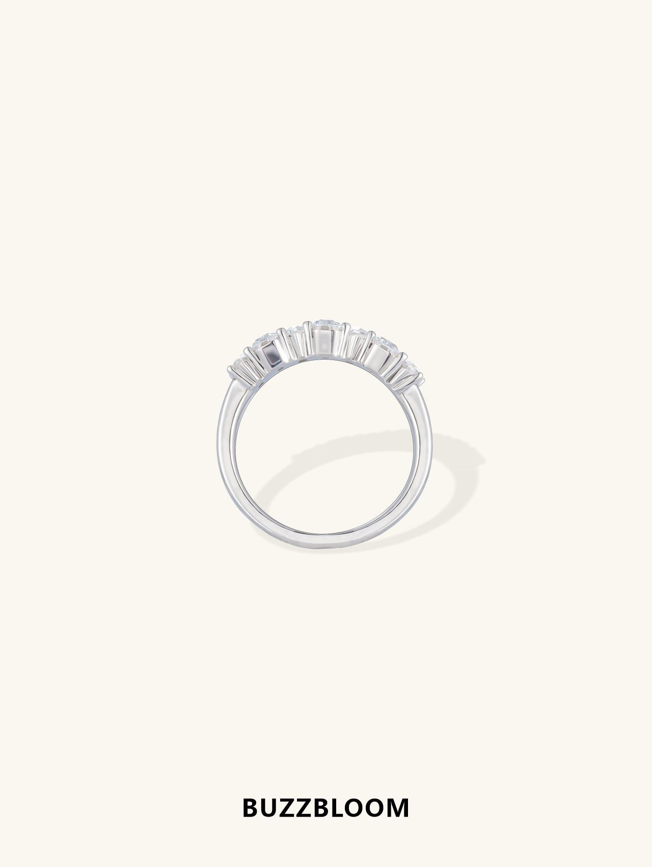 BuzzBloom emerald-cut diamond multi-stone ring in 14K white gold, front view highlighting the symmetry and brilliance of the diamonds.