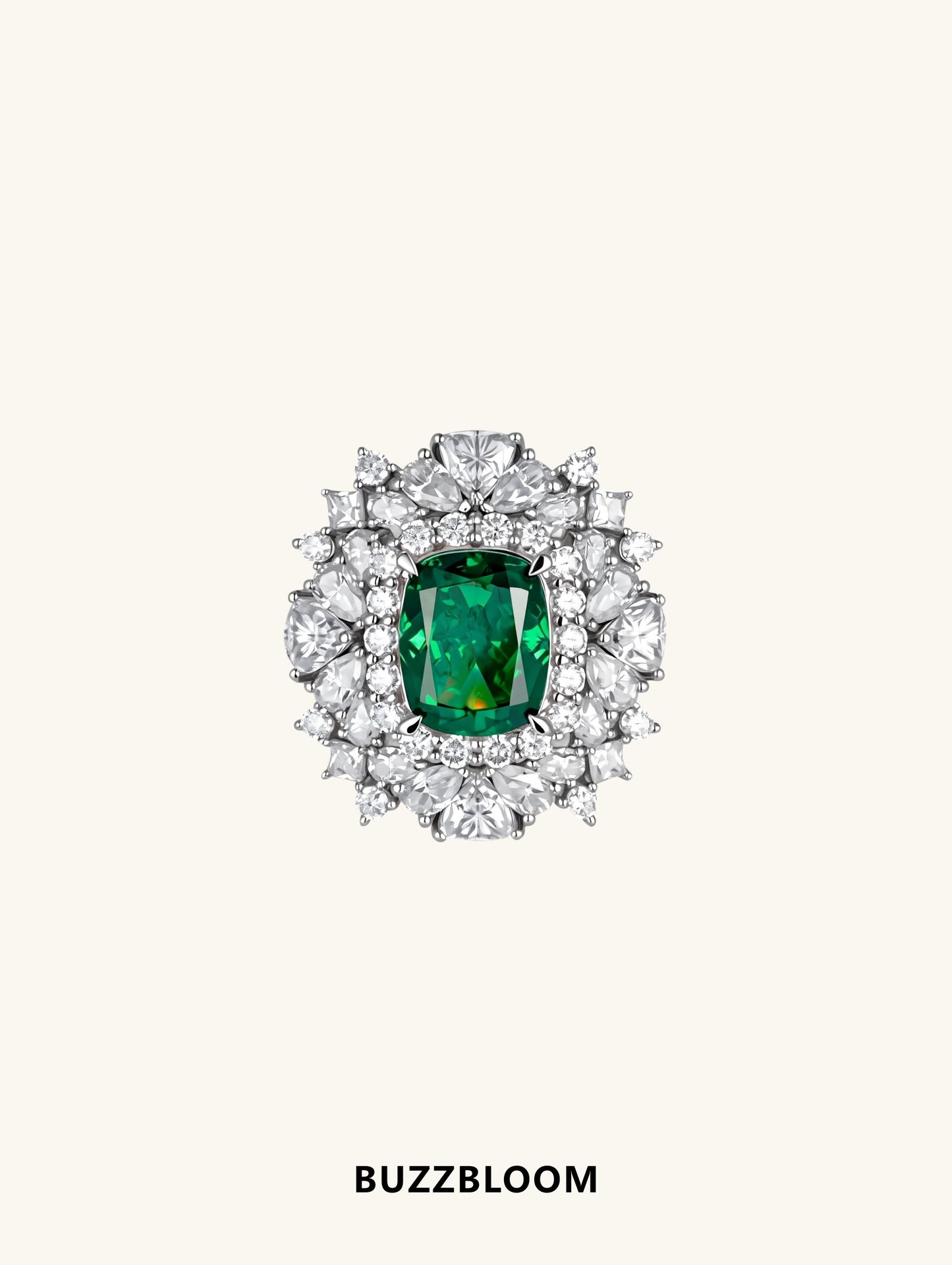 BuzzBloom emerald halo ring with cushion-cut emerald center and diamond halo, front view
