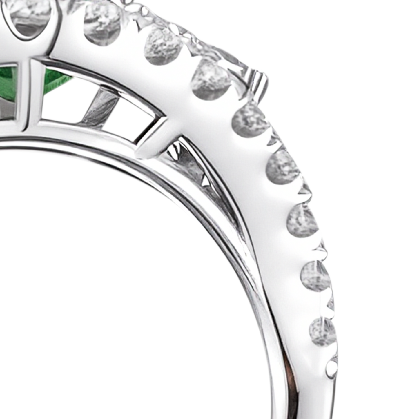 Close-up of green emerald stone in BuzzBloom halo diamond ring