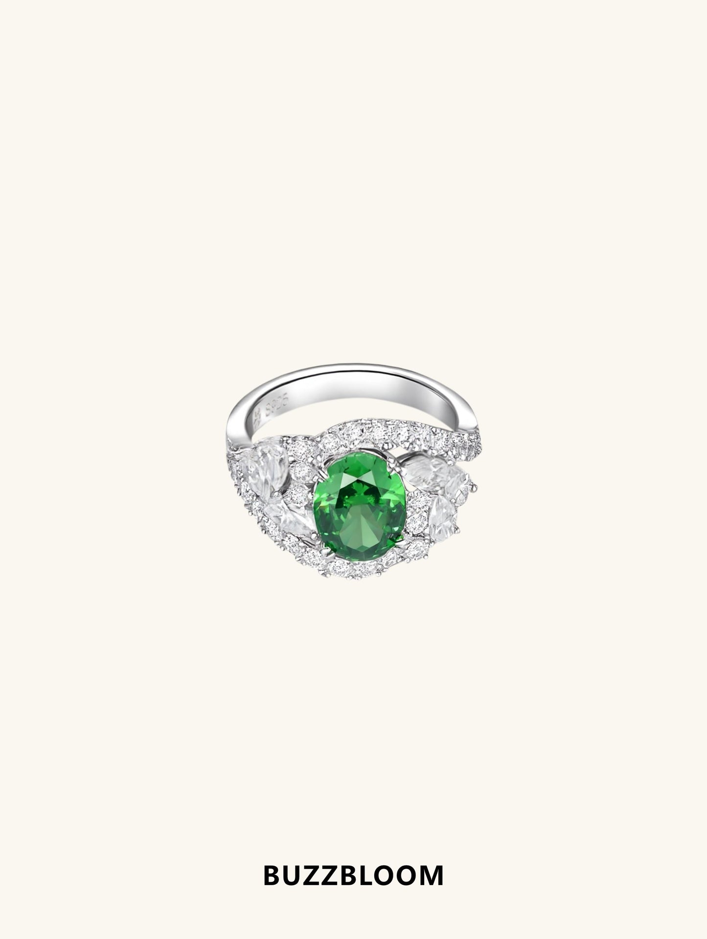 BuzzBloom emerald oval halo diamond ring front view