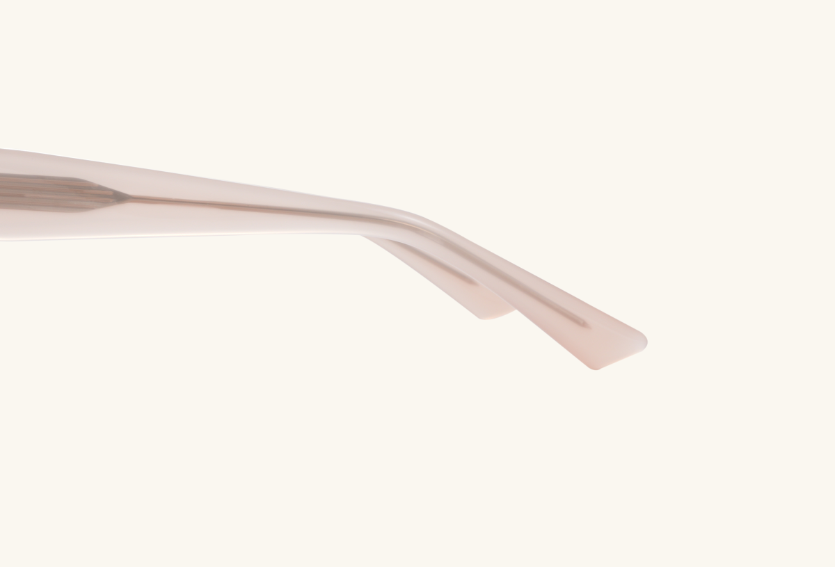 Close-up detail of BuzzBloom aviator sunglasses showing double bridge design.