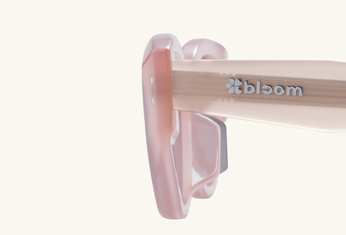 Side arm and hinge detail of BuzzBloom men’s oversized aviator sunglasses.