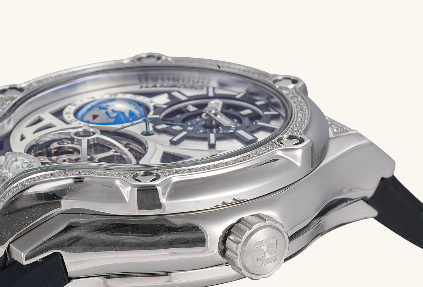 BuzzBloom mechanical watch crown and bezel detail with diamond-set accents.