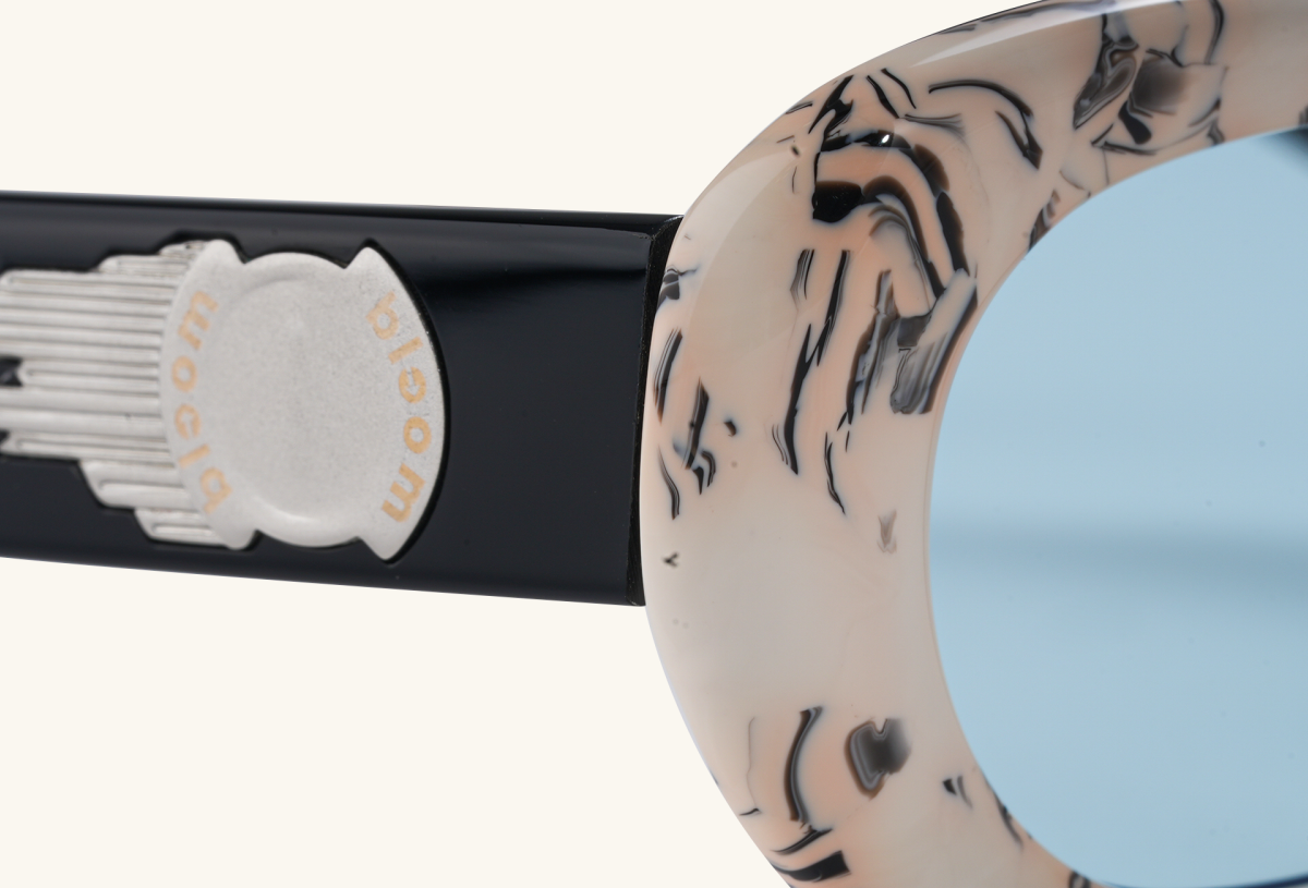 BuzzBloom branding detail on rectangular black sunglasses arm.
