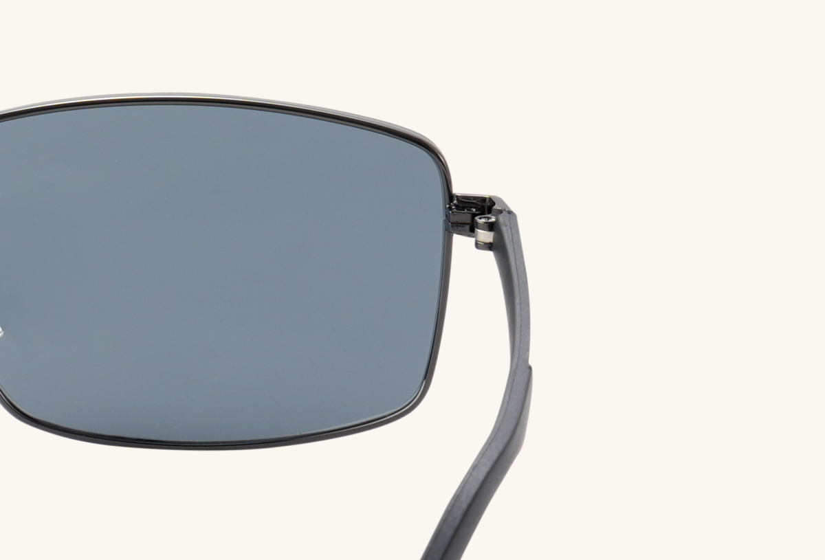 Close-up of BuzzBloom sunglasses metal hinge and temple design.