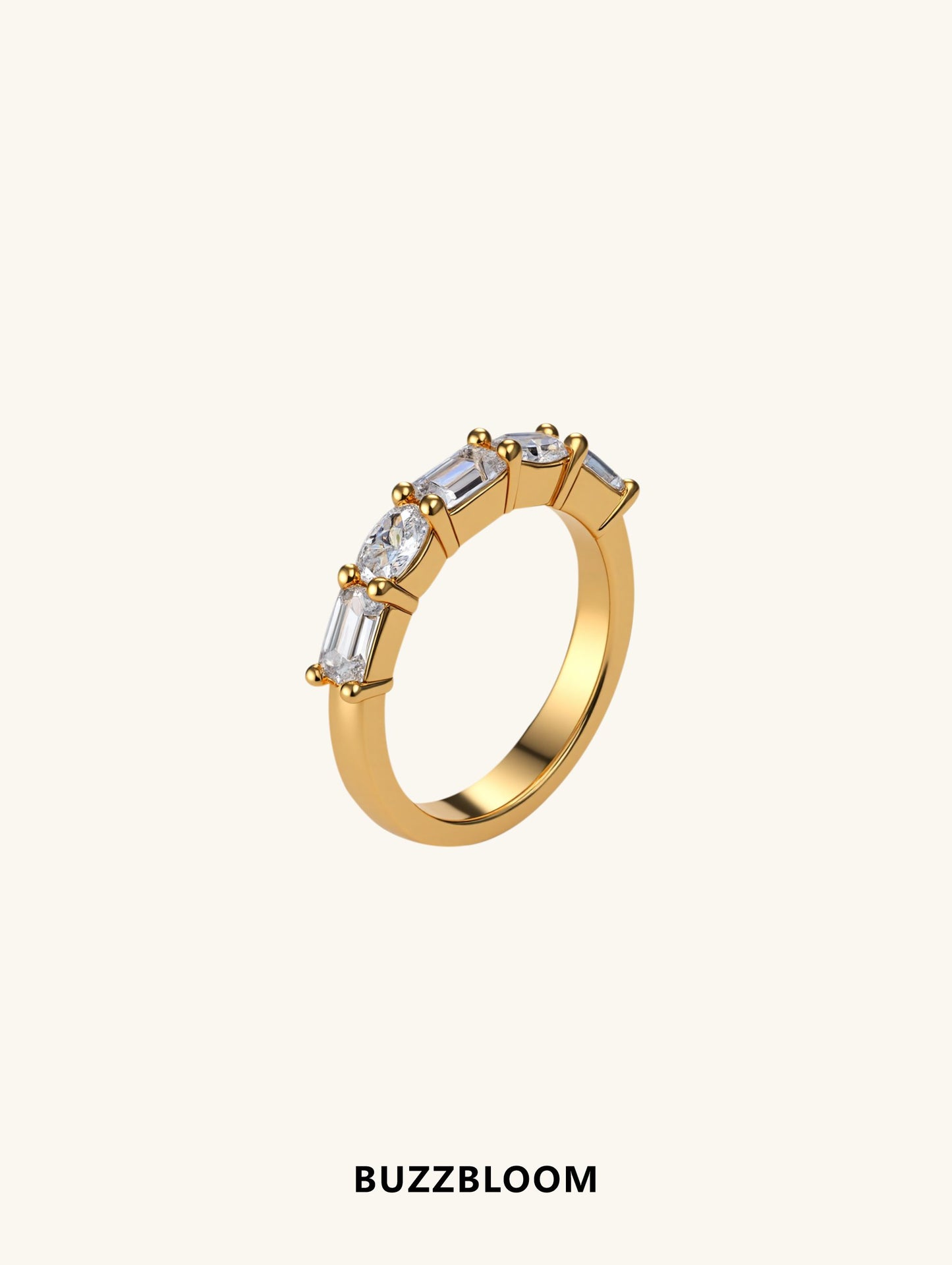 Angled view of gold moissanite ring showcasing oval center and baguette accents