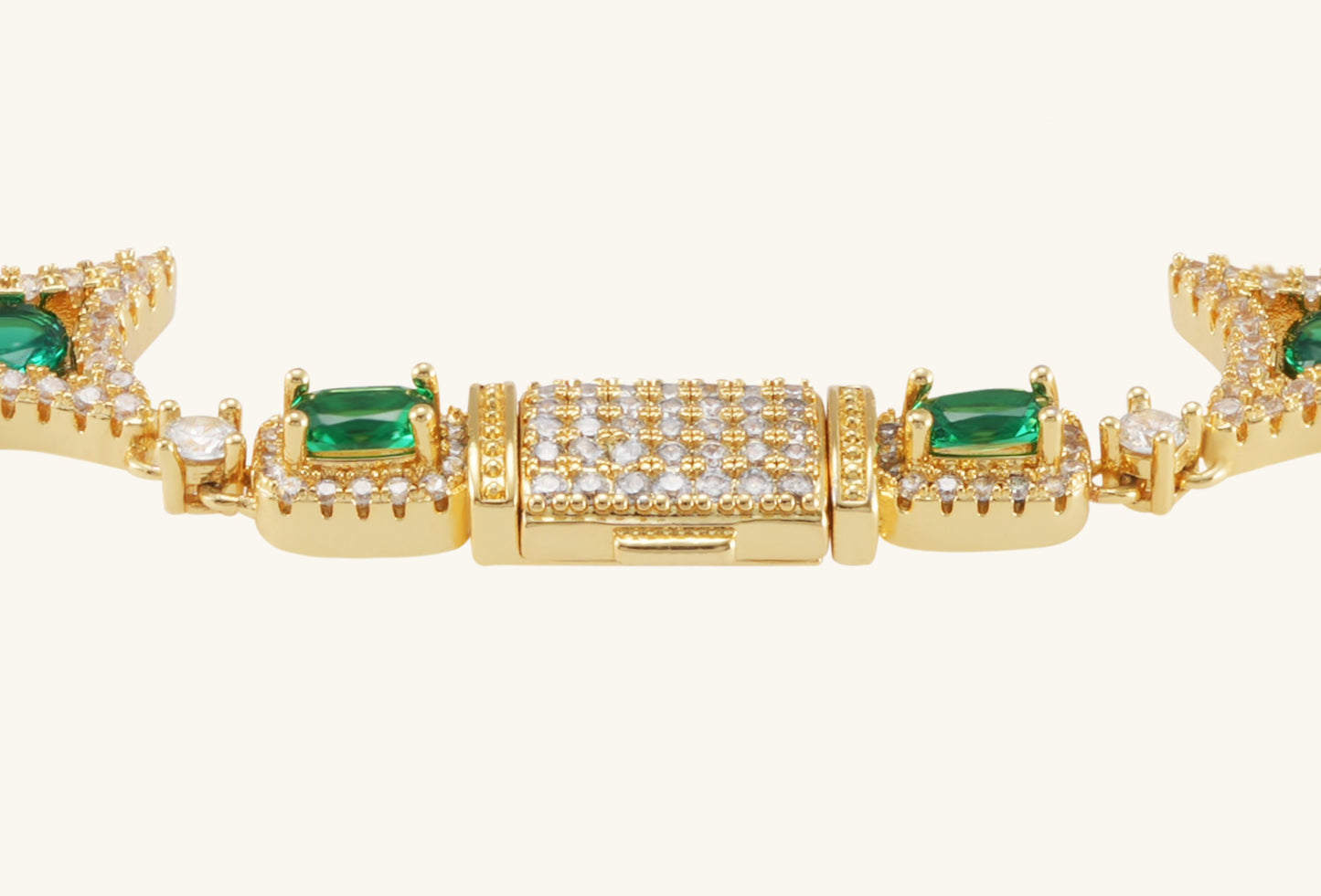 Close-up view of colorful gemstones set in 14K gold bracelet