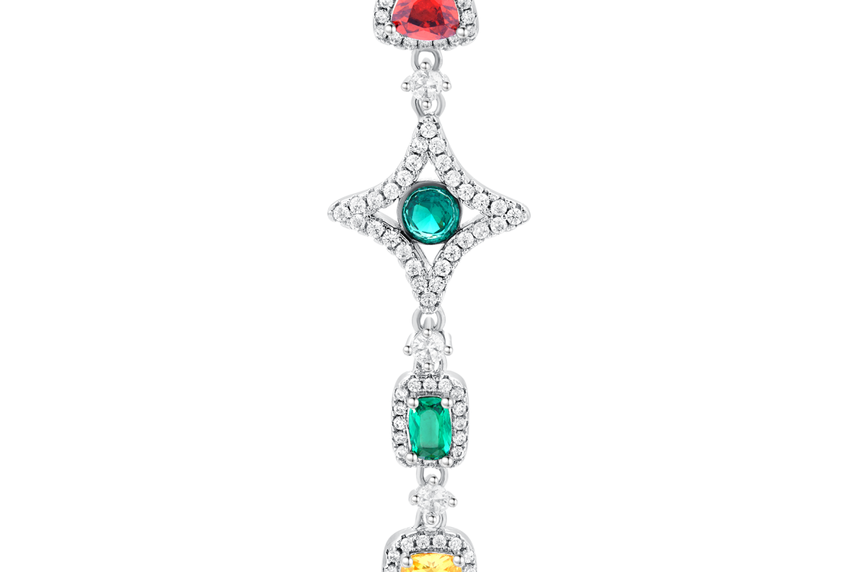 Zoom-in view of BuzzBloom necklace showcasing emerald surrounded by pavé diamonds.