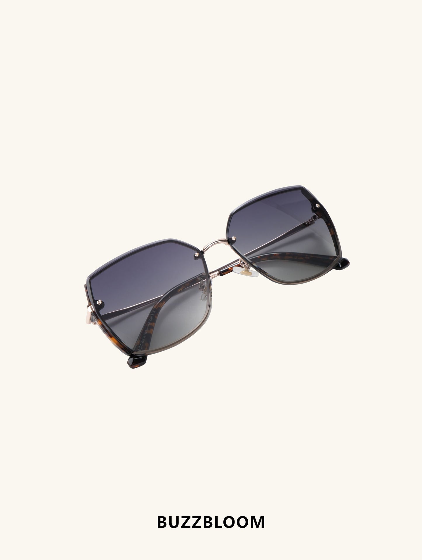 Side profile of BuzzBloom oversized square fashion sunglasses with gradient tint.