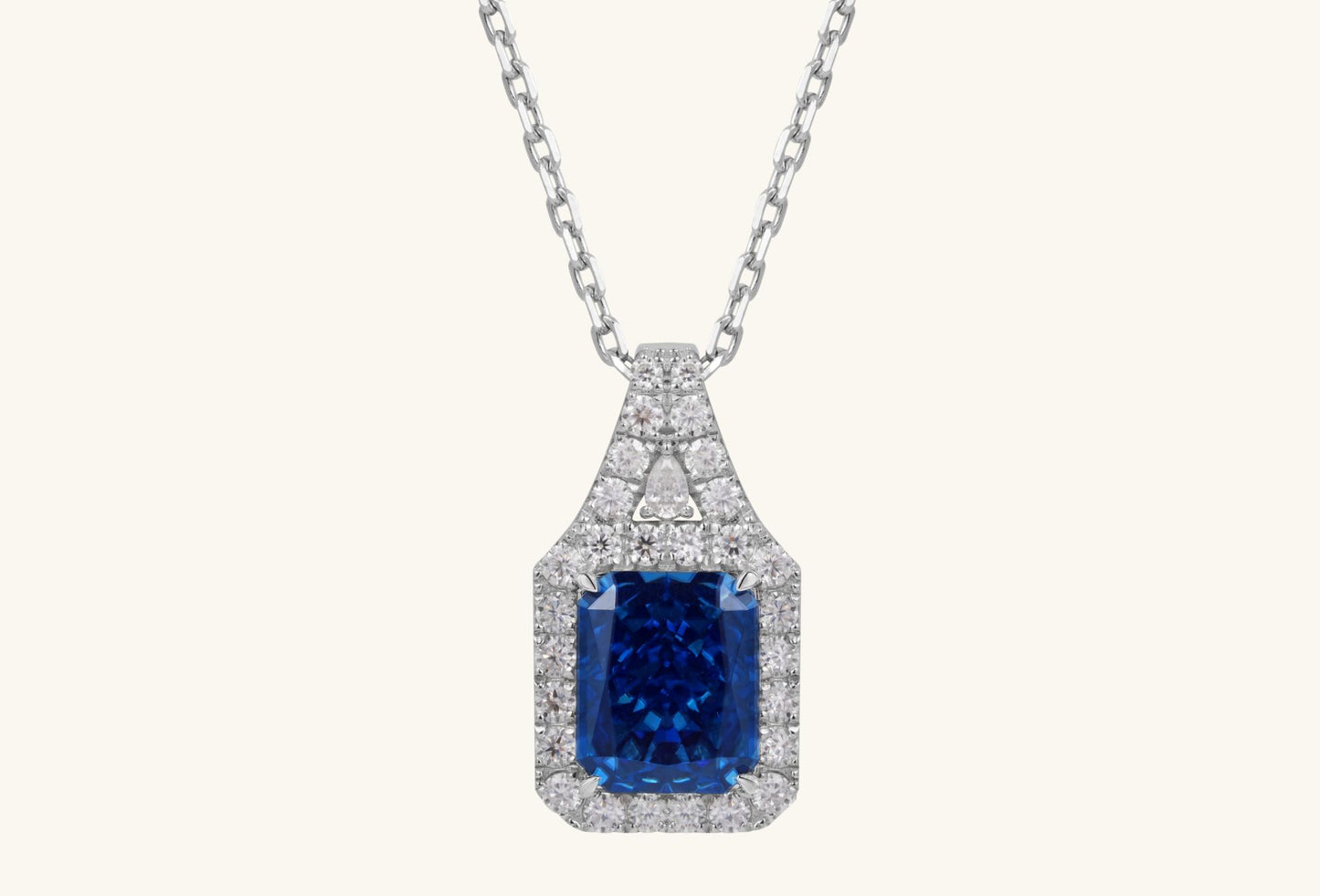 Back view of BuzzBloom sapphire halo pendant showing setting structure