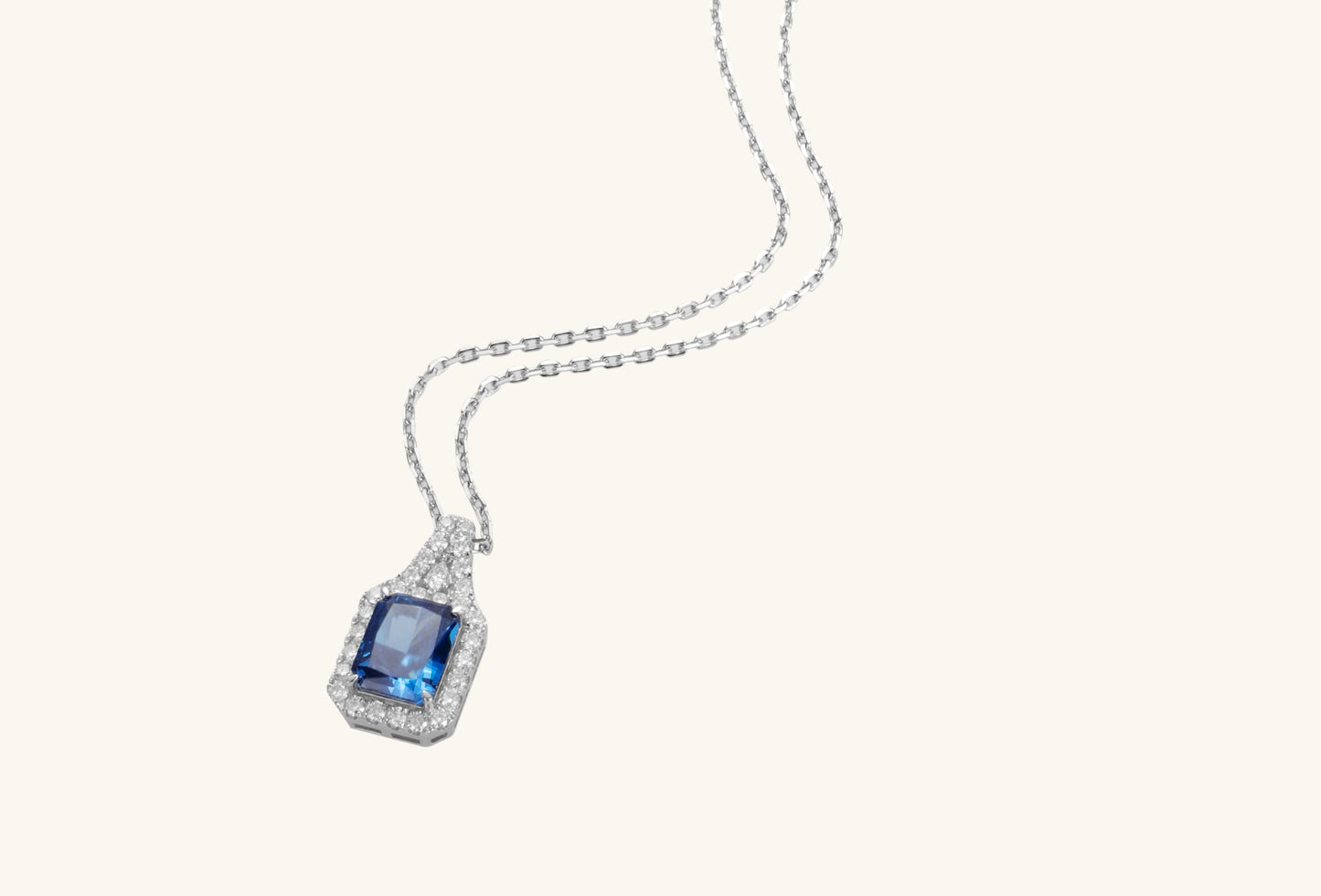 Macro shot of gemstone facets and halo craftsmanship on BuzzBloom pendant