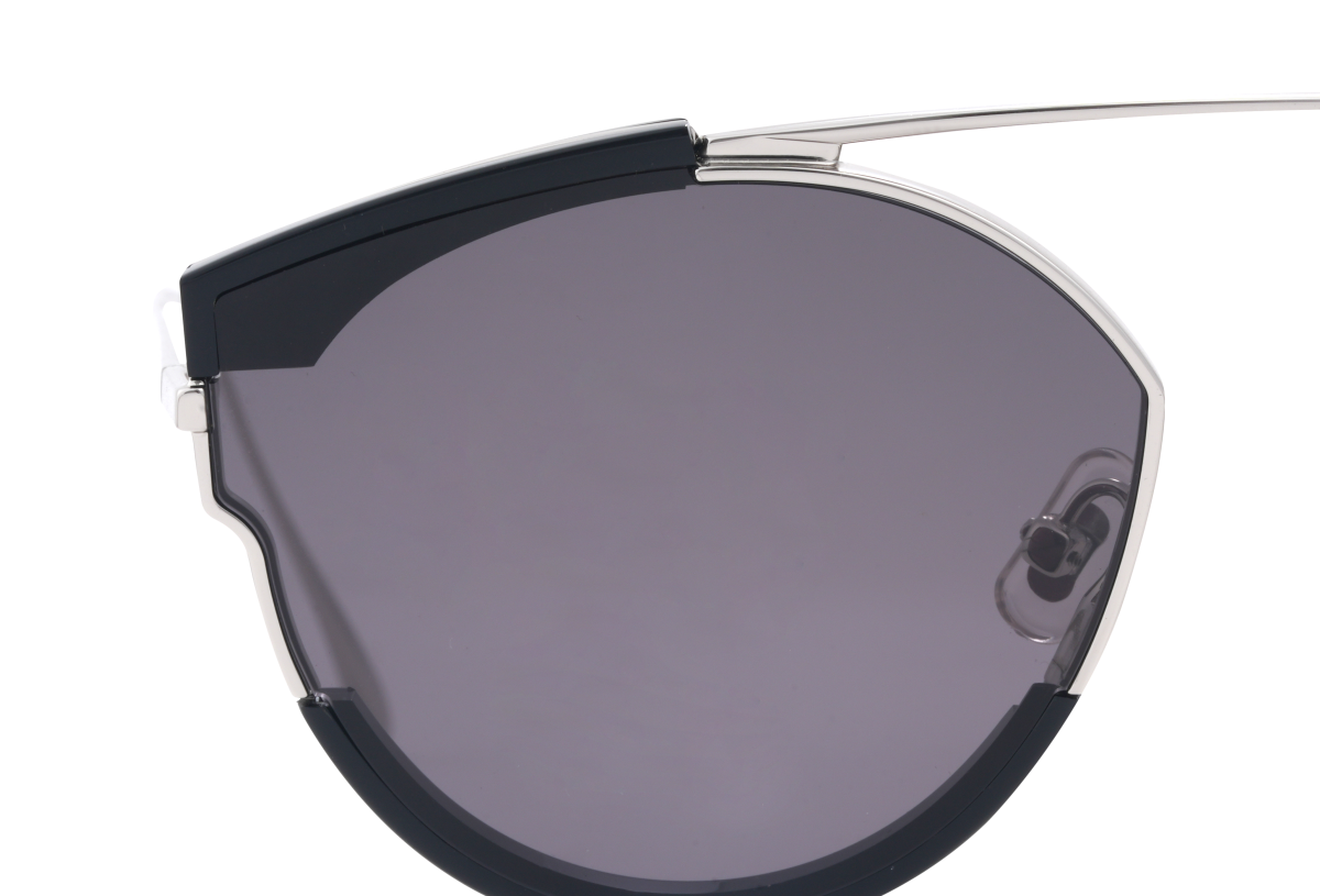Close-up of BuzzBloom sunglasses emphasizing the double-bridge metal detailing.