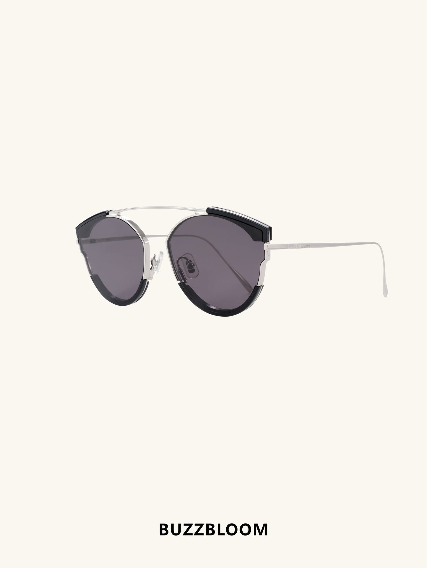 Side profile of BuzzBloom round sunglasses showcasing double-bridge frame detail.