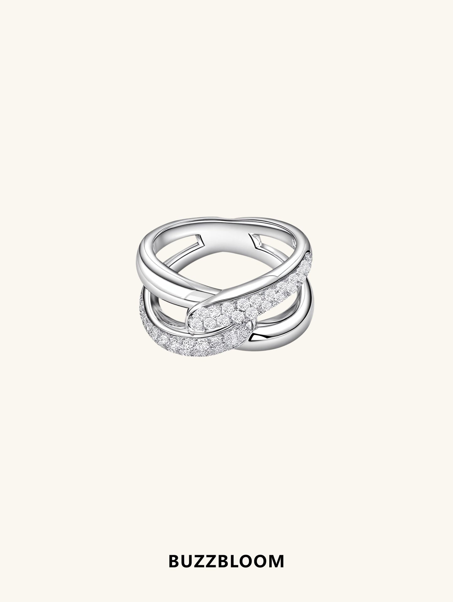 Top view of BuzzBloom sterling silver crossover ring with intertwined pavé design