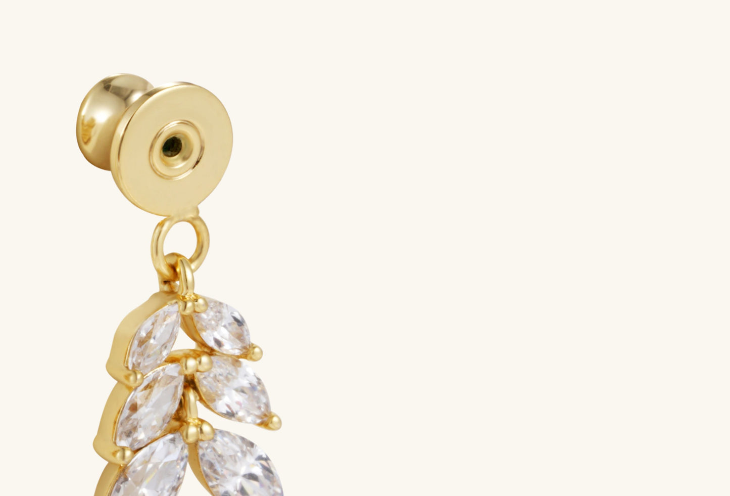 Close-up of BuzzBloom Willow Leaf Diamond 14K Stud Earrings showing intricate marquise diamond settings and 14K gold prongs.
