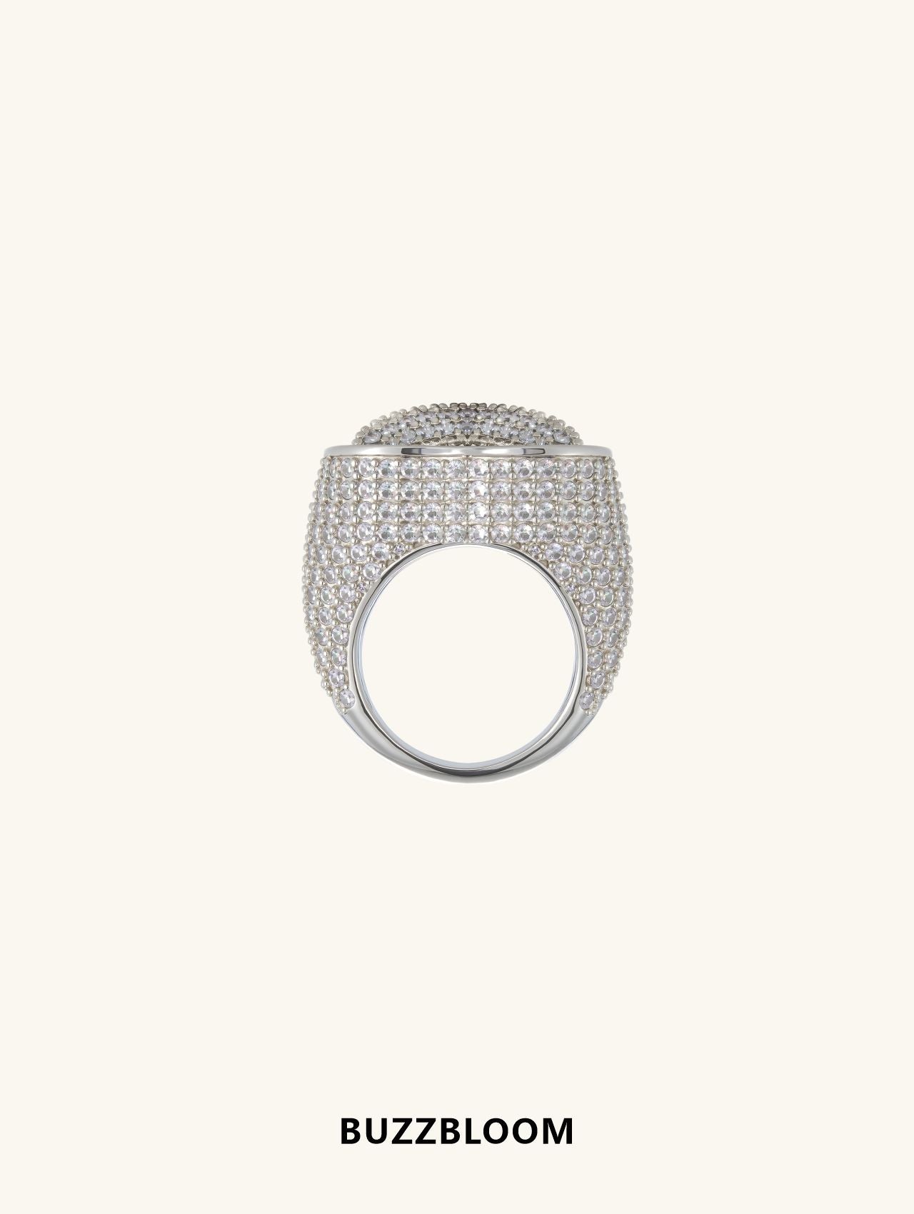 Side profile of diamond heart ring by BuzzBloom in 14K white gold with full pavé diamonds, symbolizing love and elegance.