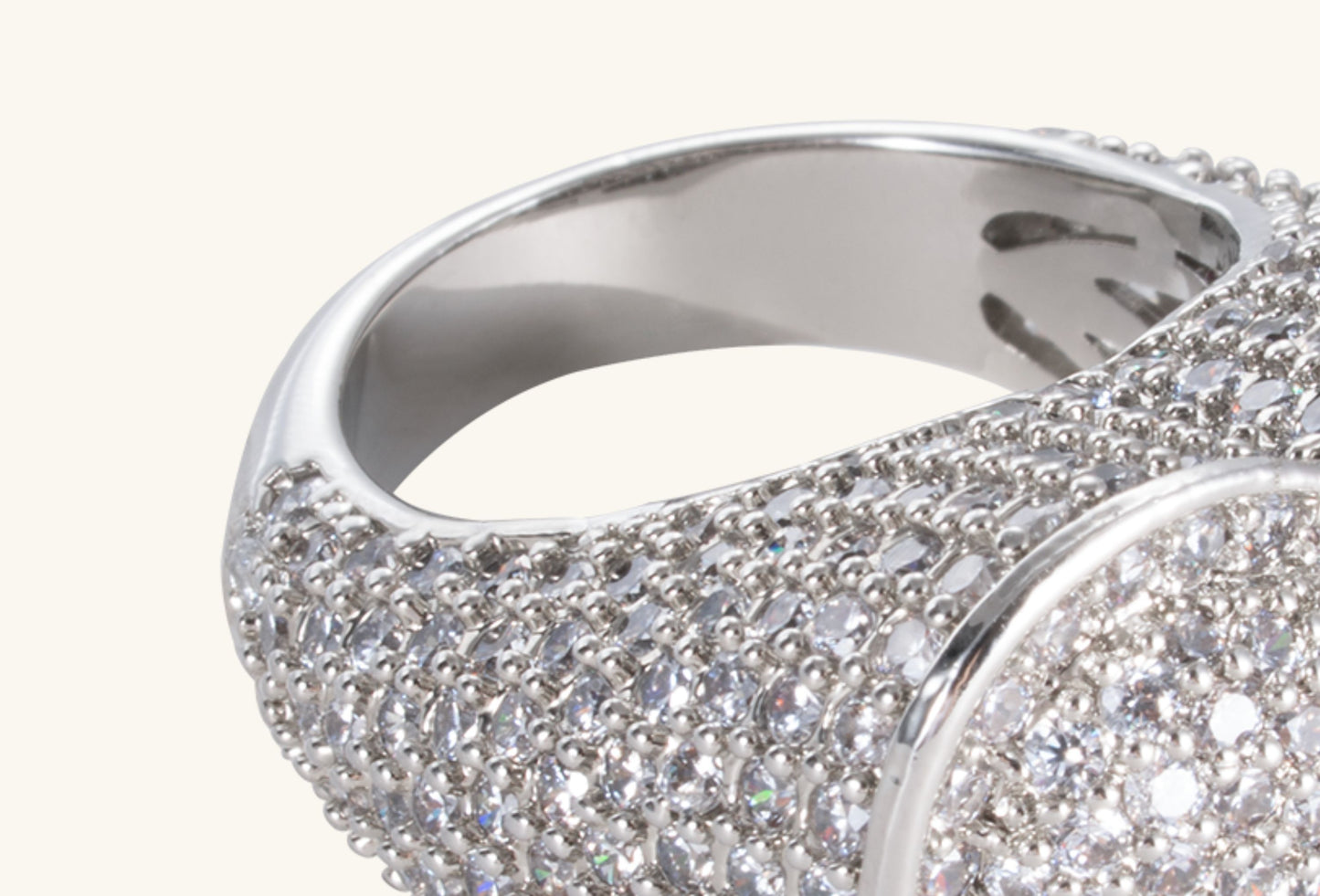 Side view of BuzzBloom 14K diamond heart ring in white gold showcasing pavé diamonds and elegant design