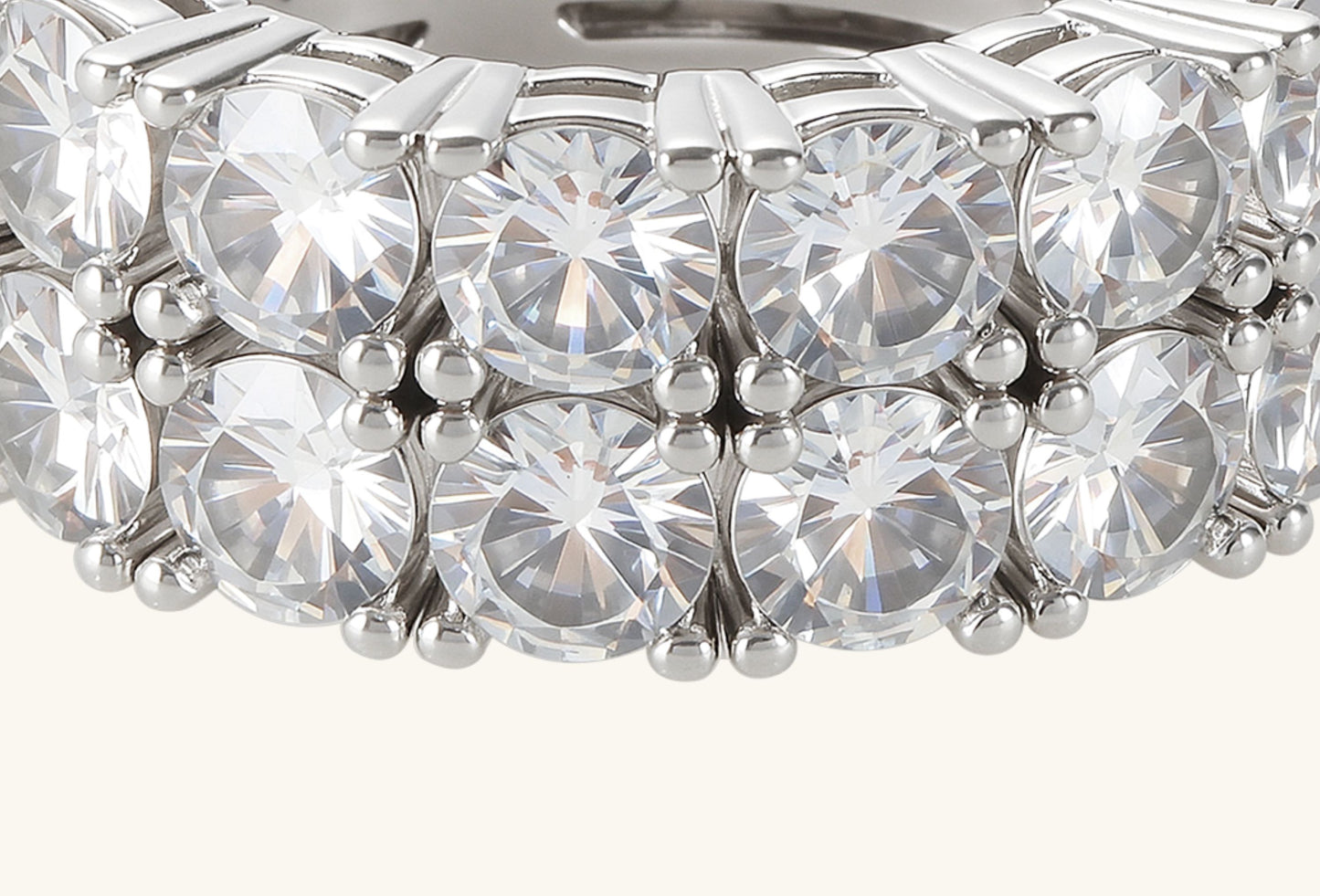 Close-up of BuzzBloom double row round diamond eternity ring in white gold showcasing brilliant pavé diamonds