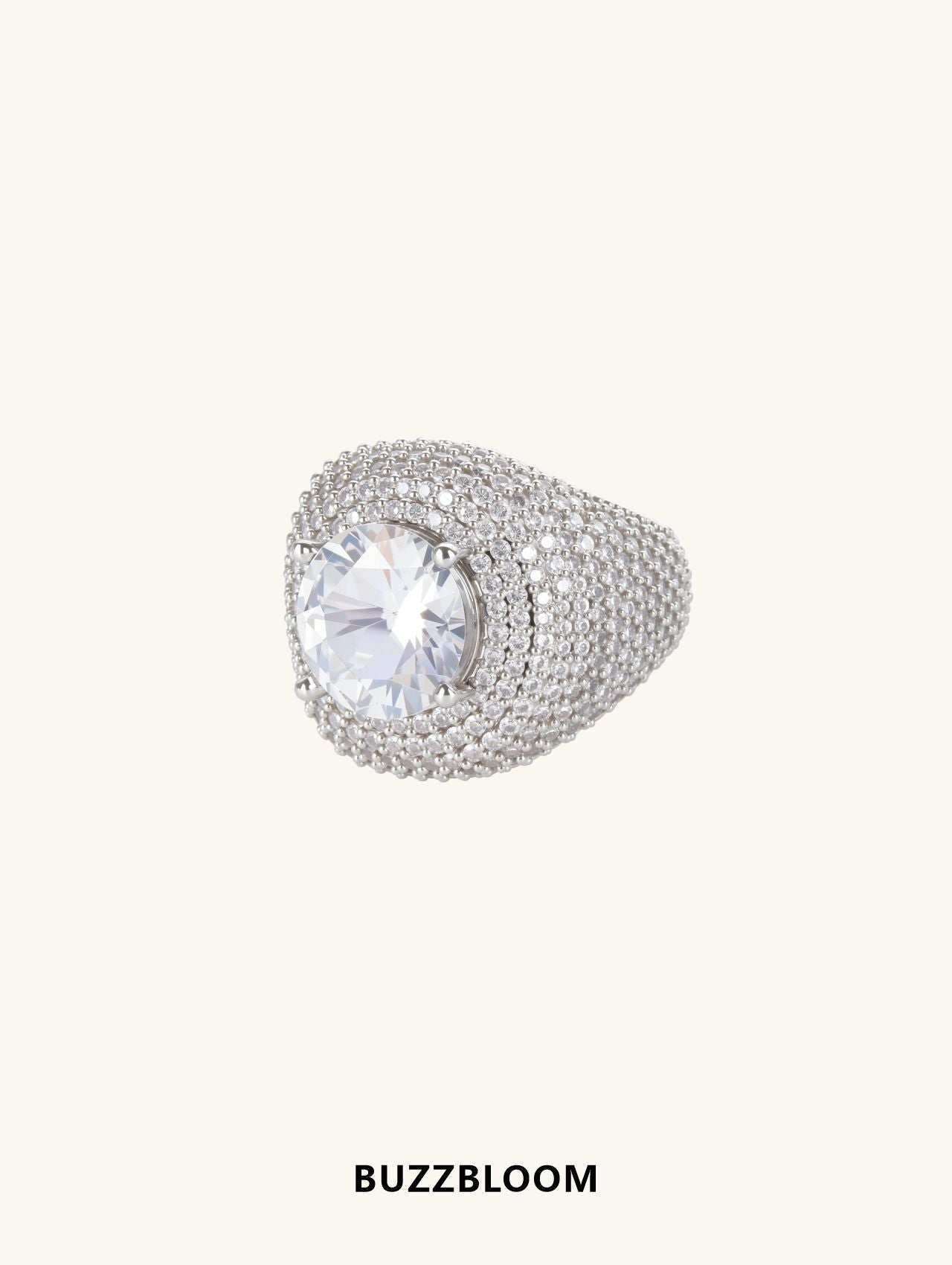 Side profile of BuzzBloom luxury wide band diamond ring in 14K white gold with full pavé diamonds and large round solitaire center stone, perfect for bridal and evening wear.