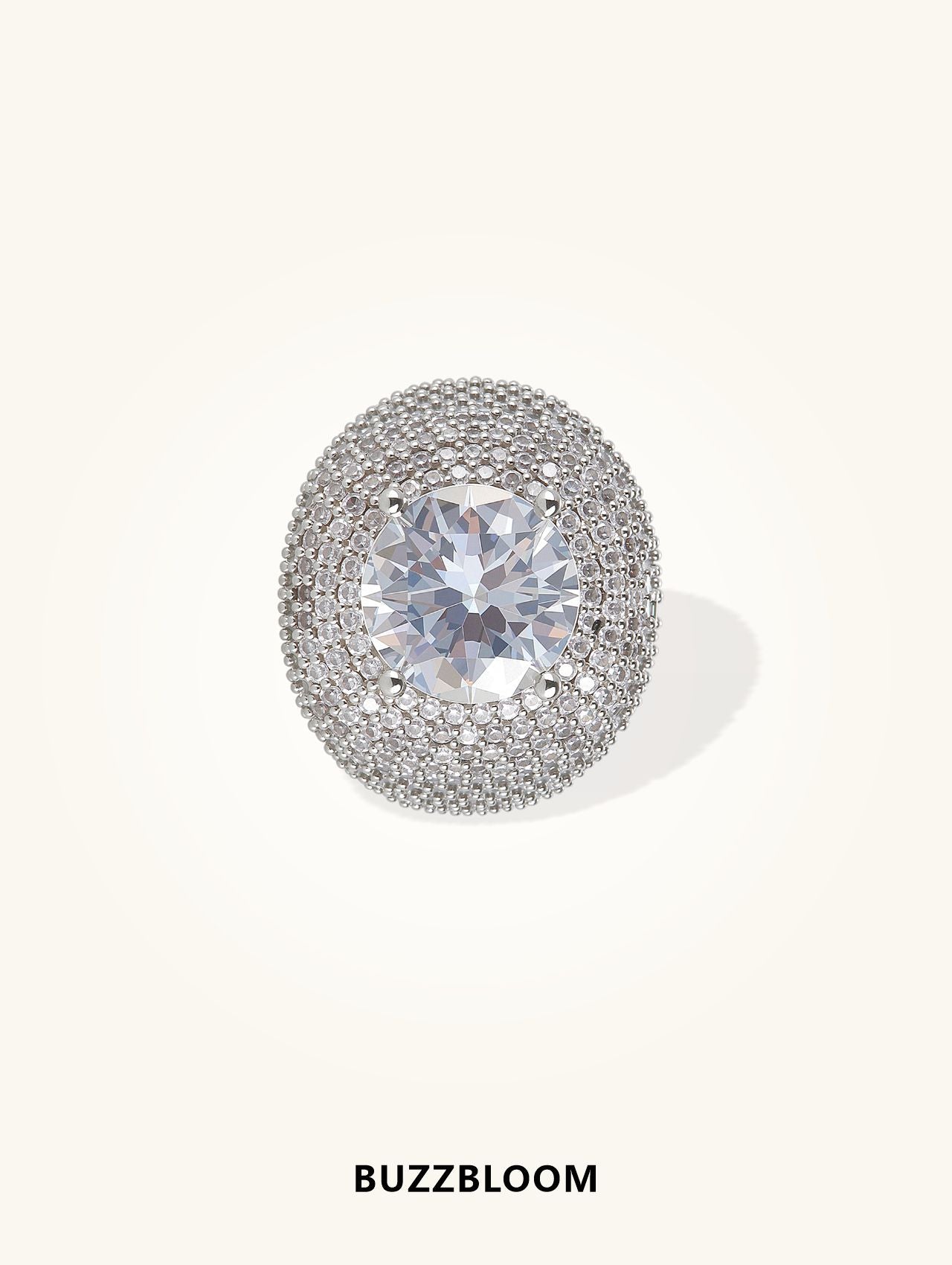 BuzzBloom luxury wide band diamond ring in 14K white gold, front view, featuring a large round solitaire diamond with full pavé setting for weddings, parties, and statement looks.