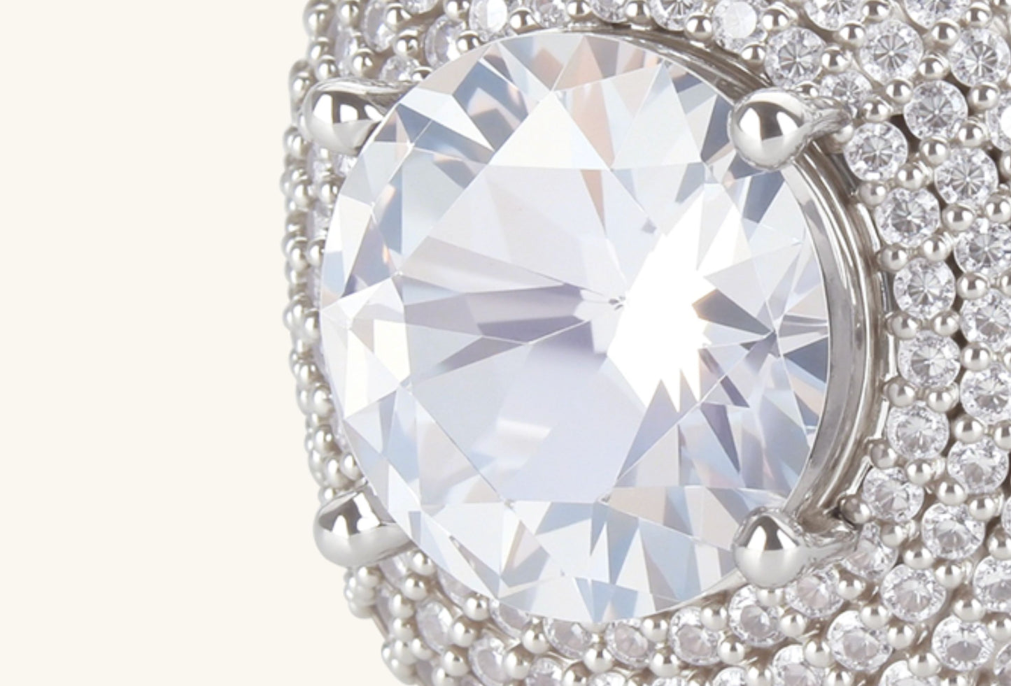 Close-up of BuzzBloom 14K white gold wide band diamond ring with solitaire round diamond and pavé setting
