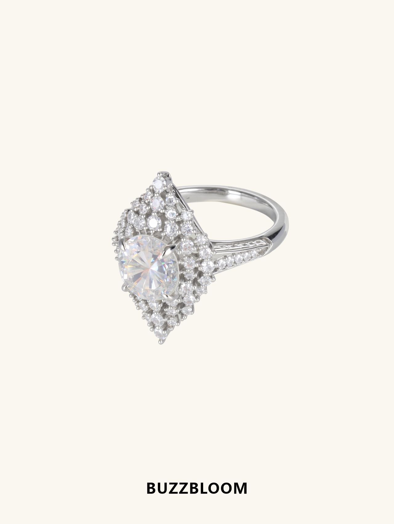 Angled view of Snow Queen diamond ring by BuzzBloom in 14K white gold, with round brilliant center diamond and snowflake-inspired halo for elegant bridal and evening wear.